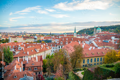 Aerial view of Prague city with red roofs and cathedral in sunset time, Prague, Czech Republic