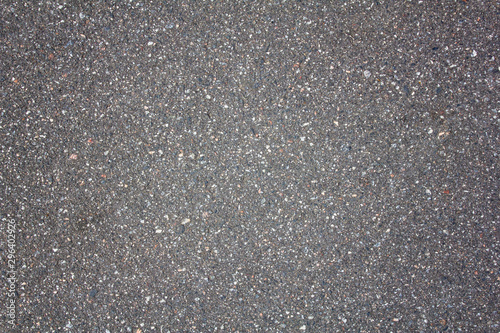 Wallpaper Mural old gray asphalt with protruding multi-colored white and blue small stones. rough surface texture Torontodigital.ca