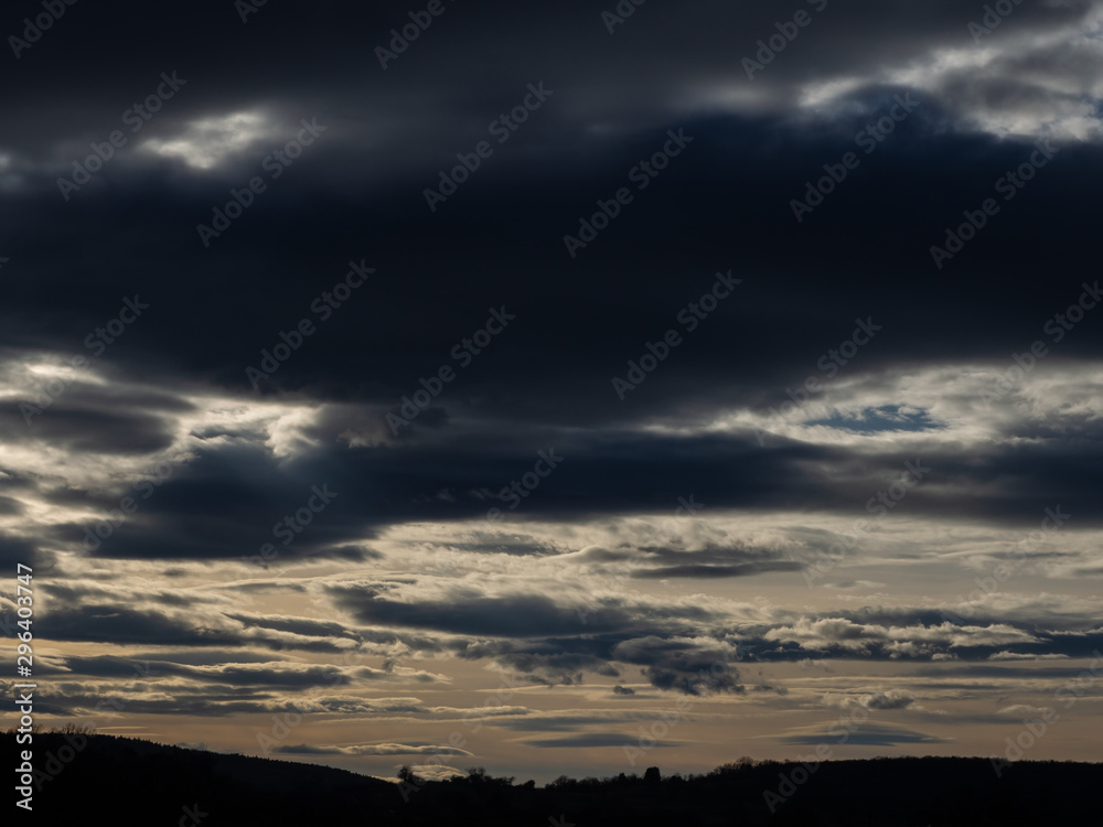 Landscape cloudy sky and silhouette of hills