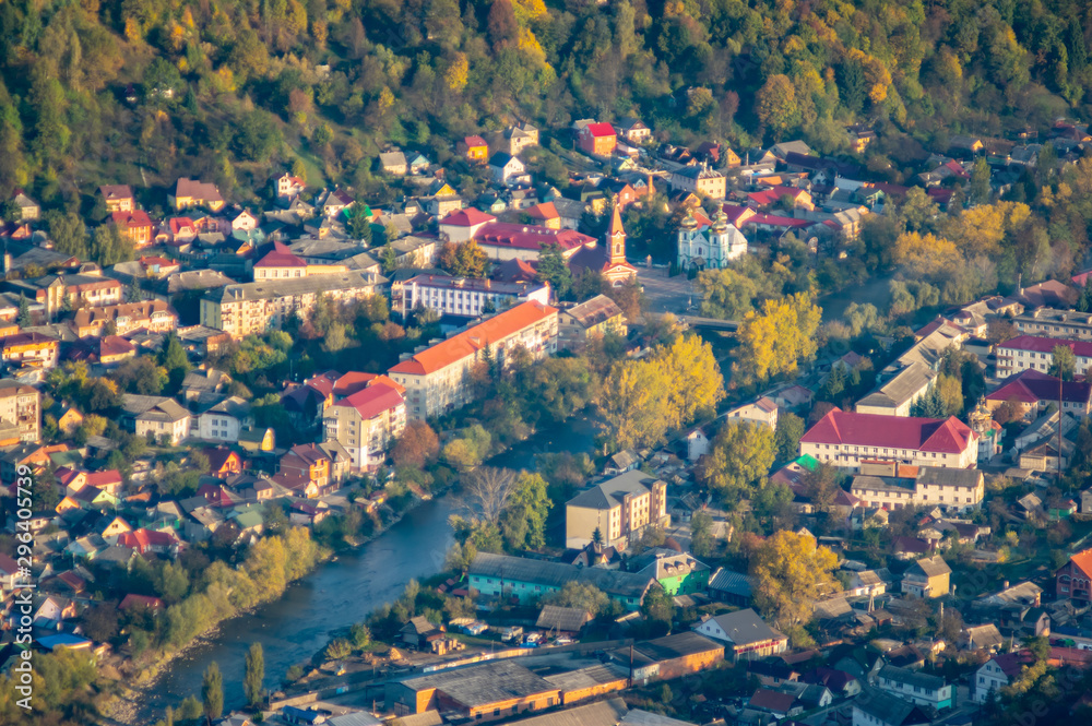 Fototapeta premium Village in the mountains in autumn