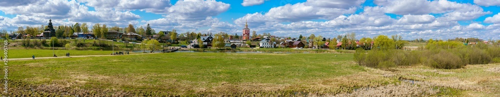 Panoramic view of Suzdal, a well preserved old Russian town-museum. A member of the Golden ring of Russia. View from the Kremlin Panoramic view of Suzdal, a well preserved old Russian town-museum. A member of the Golden ring of Russia. View from the Kremlin