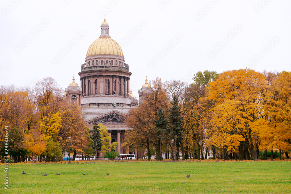St. Petersburg, St. Isaac's Cathedral among the autumn leaves, the lawn in the Park in front of the Cathedral