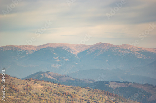 Mountains in a blue haze in autumn afternoon
