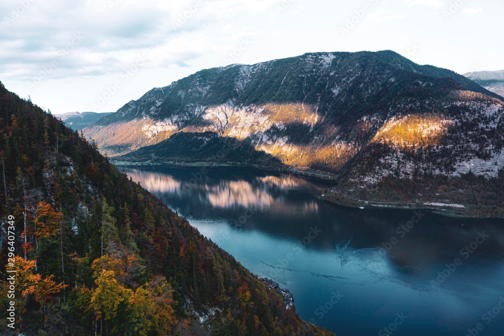 Autumn sunset over mountains and lake