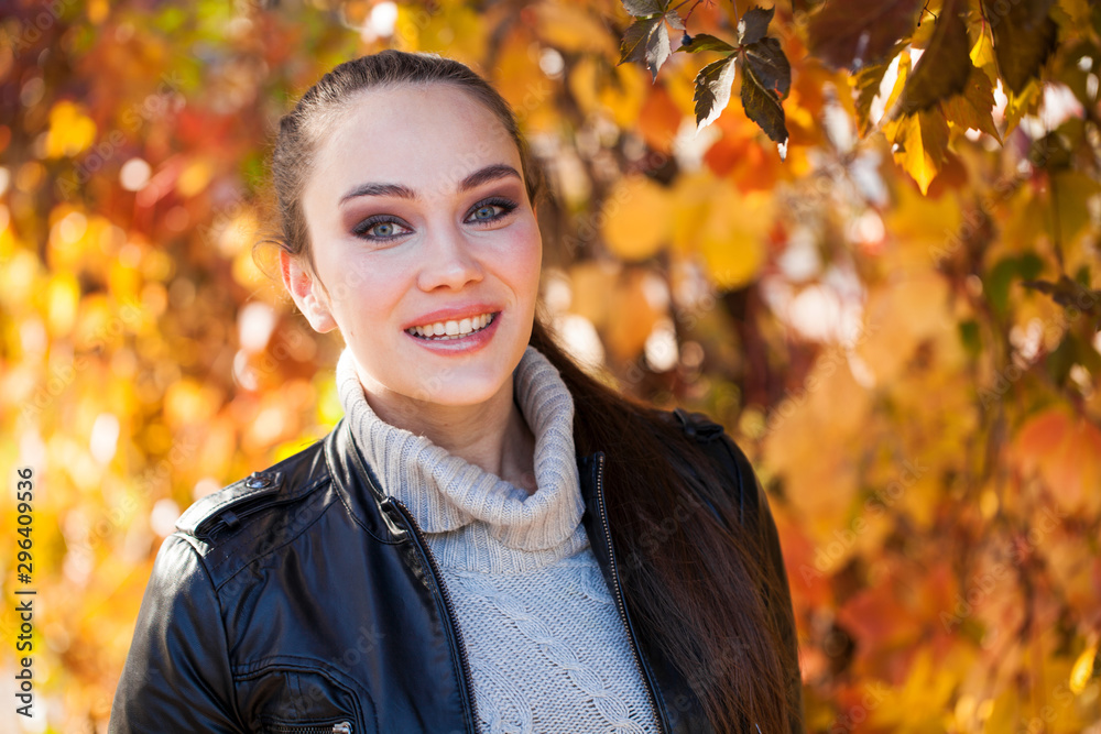 Portrait of a young beautiful model in a black leather jacket Portrait of a young beautiful model in a black leather jacket