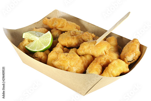 Fotografi Kibbeling in a cardboard tray isolated on white background