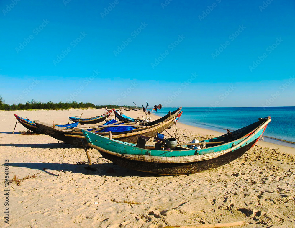 Vietnamese fishing boats on the beach in Dong Ha, Vietnam