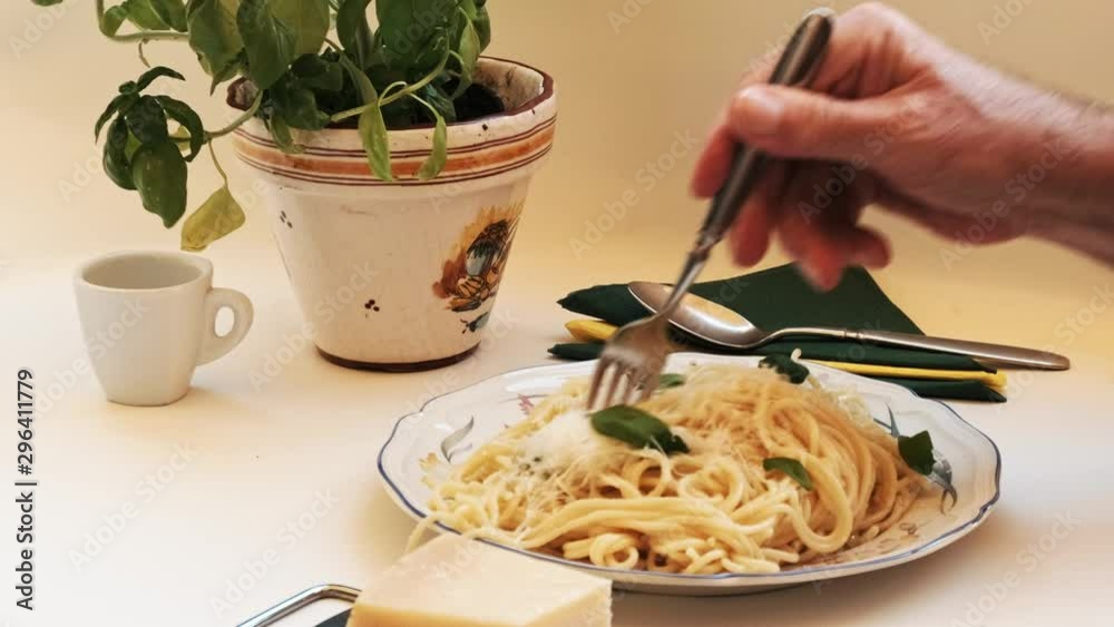 Spaghetti - the stuffed and spiced pasta is rolled up with a fork and eaten.