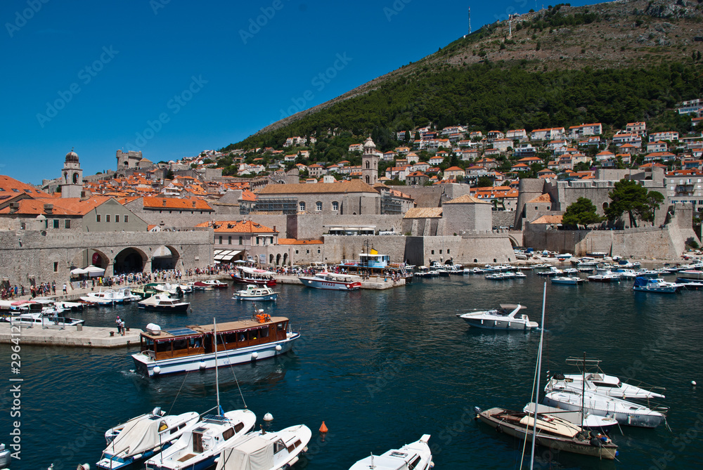 Dubrovnik, Croatia: View of the Old Port. Dubrovnik is a Croatian city on the Adriatic Sea. It is one of the most prominent tourist destinations in the Mediterranean Sea