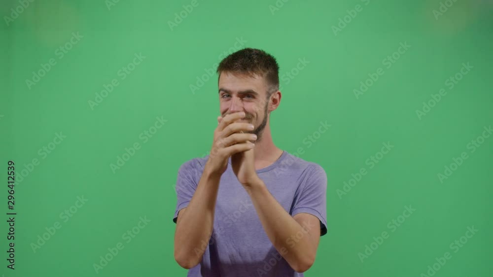 Adult Man Clapping Slowly Disappointed And Unimpressed. Studio Isolated Shot Against Green Screen Background Adult Man Clapping Slowly Disappointed And Unimpressed. Studio Isolated Shot Against Green Screen Background