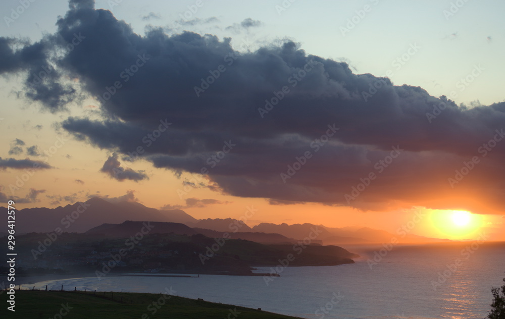 A cloudy sunset by the sea at the Cantabrian sea, Gerra, Cantabria, Spain