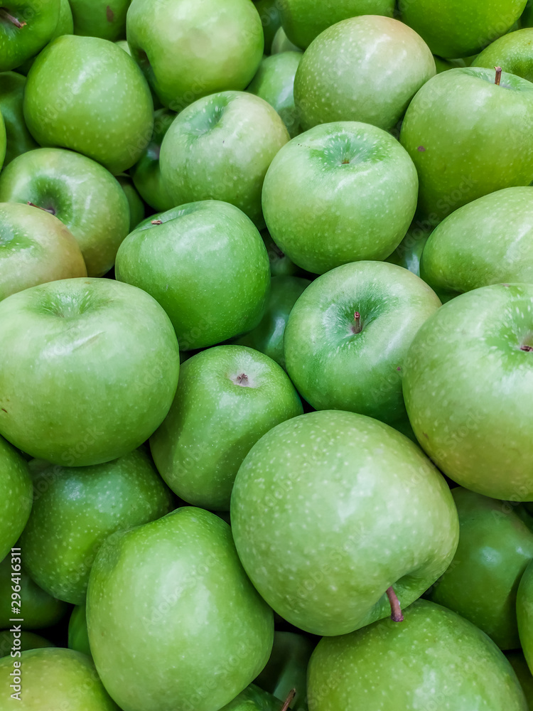 Background green apples. Fruit background. Apples on the apples. Background green apples. Fruit background. Apples on the apples.