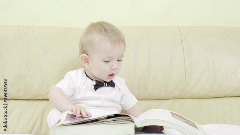 Funny baby play with money, child eat dollars, innocent ignorance Funny baby play with money, child eat dollars, innocent ignorance