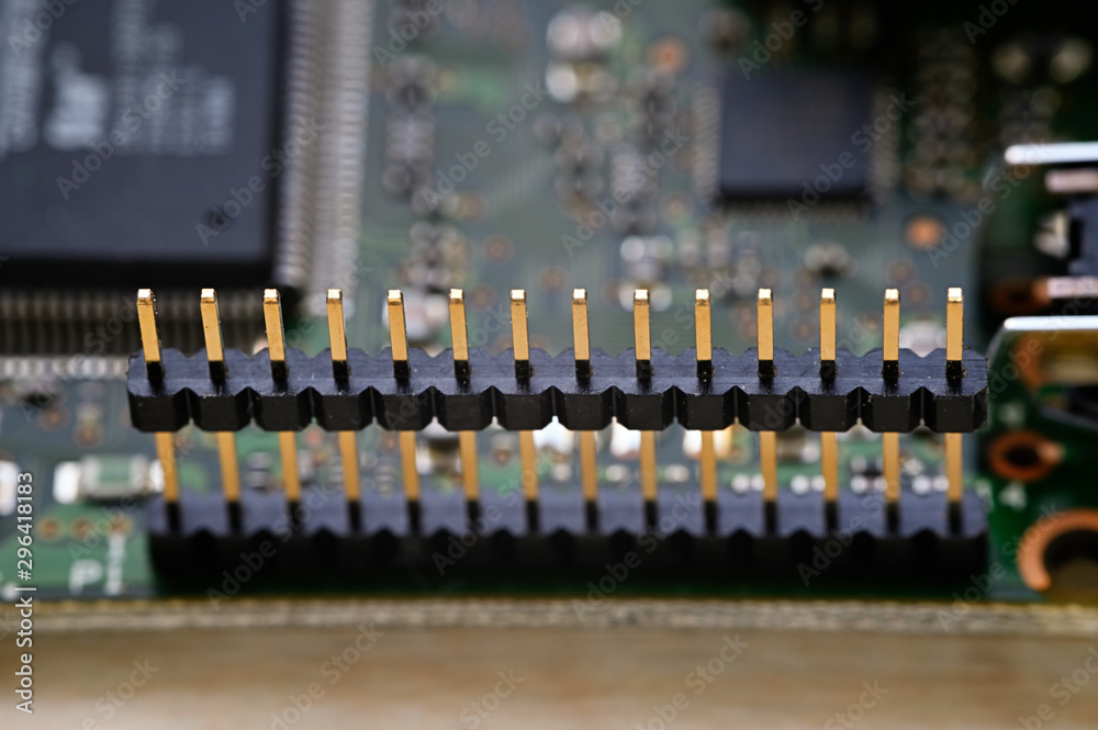A series of plug connectors on a printed circuit board. A series of plug connectors on a printed circuit board.