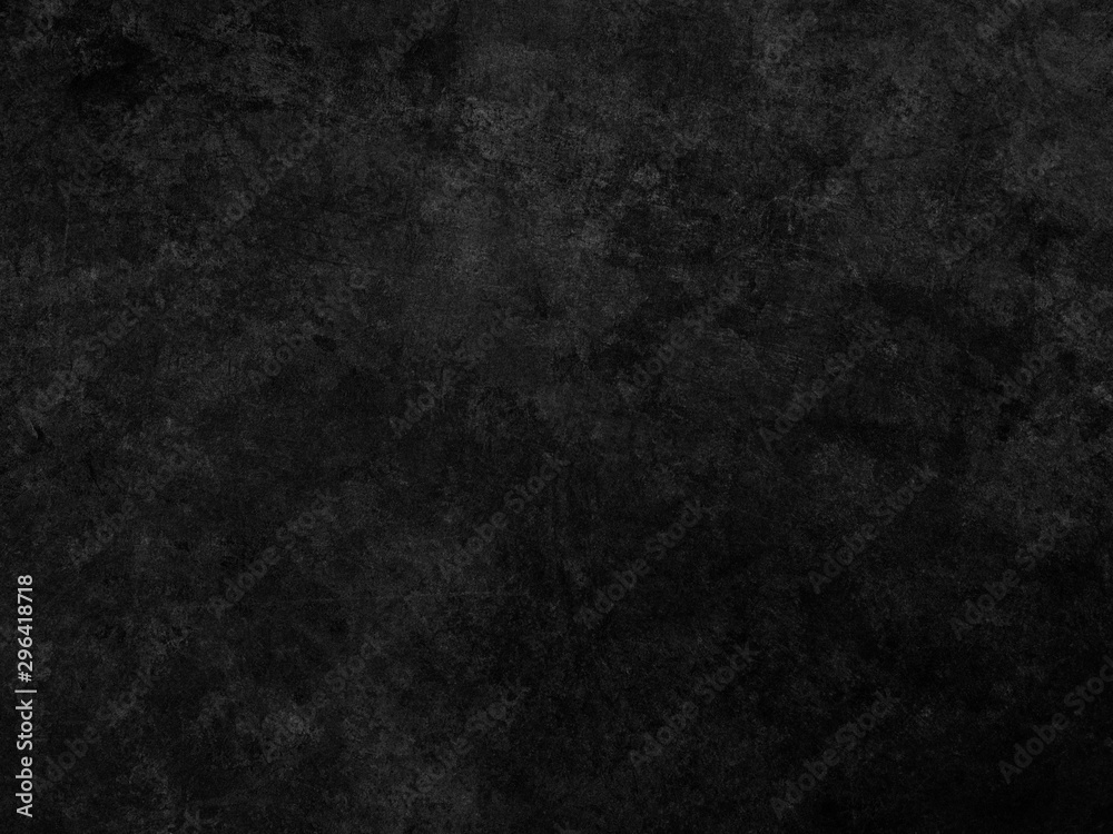 Dark gray scratched concrete wall texture as background.