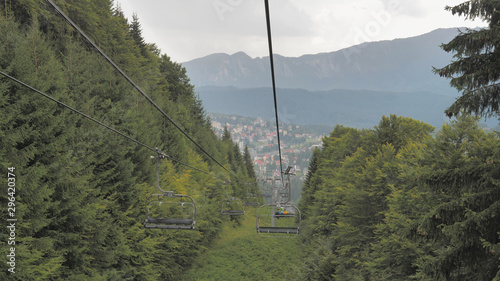 Chairlift view over green mountains, spring holiday, gorgeous panorama