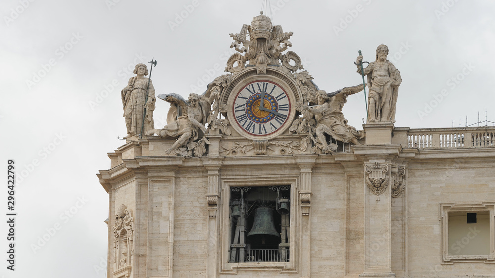 Bells ring in the San Pietro Papal Basilica belfry in Vatican during Pope preach