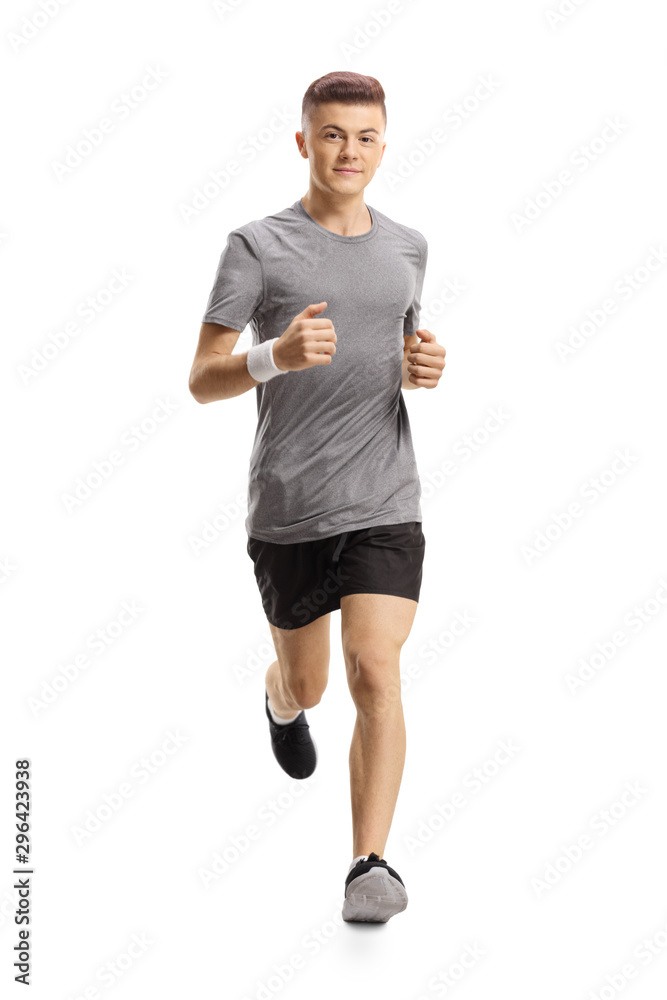 young guy jogging towards the camera young guy jogging towards the camera
