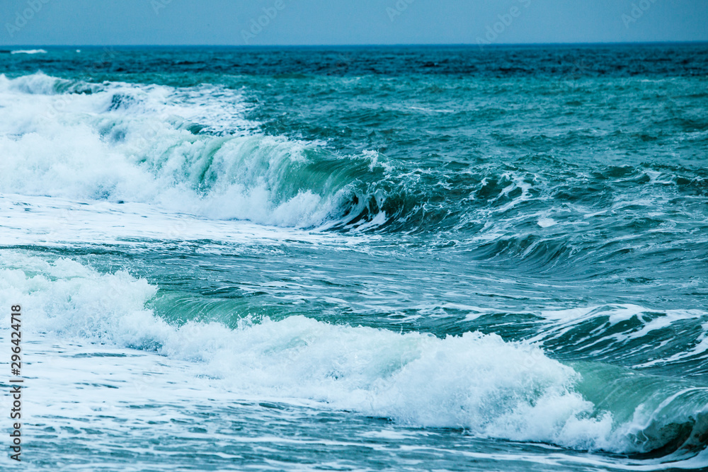 waves on the surface of the blue sea