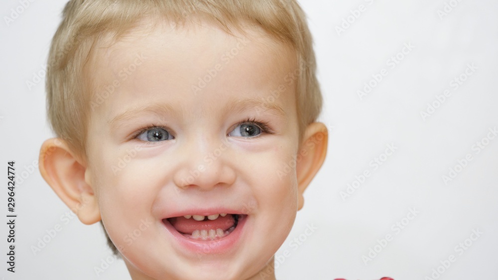 Adorable blue eyes blond hair boy kid laughing Adorable blue eyes blond hair boy kid laughing