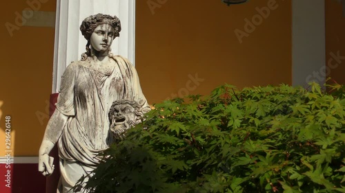 The statue of the Muse of Melpomene with a tragic mask in his hands in the palace of Achilleion built by the Empress of Austria, Elizabeth (Sissi). Corfu island, Greece.