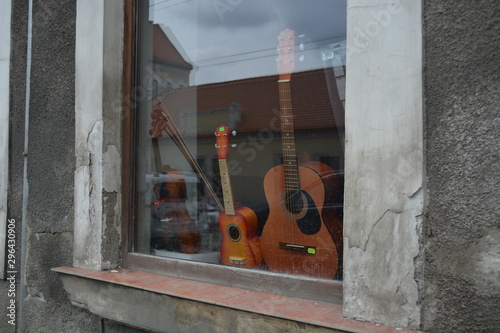 old guitars on window