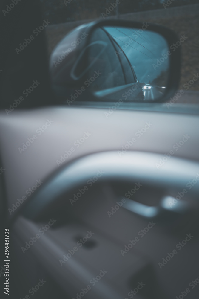 Cars on a highway at a rainy dusk (shallow DOF; color toned image) Cars on a highway at a rainy dusk (shallow DOF; color toned image)