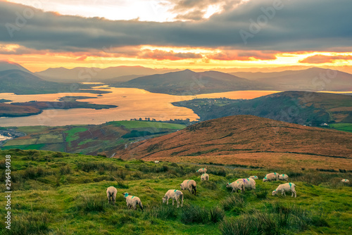 Beautiful view landscape seascape sunrise morning sunlight Valentia Island  Cromwell Point Lighthouse Portmagee Ring ok Kerry Ireland colors amazing splitting lights