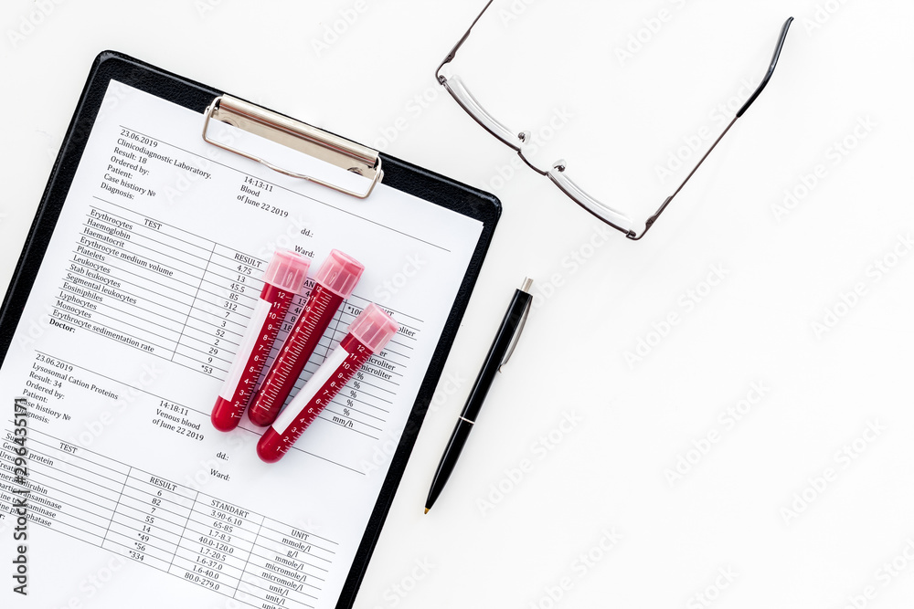 Blood test results on white background top view space for text