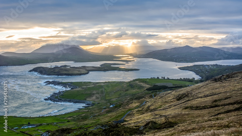 Beautiful view landscape seascape sunrise morning sunlight Valentia Island Cromwell Point Lighthouse Portmagee Ring ok Kerry Ireland colors splitting light