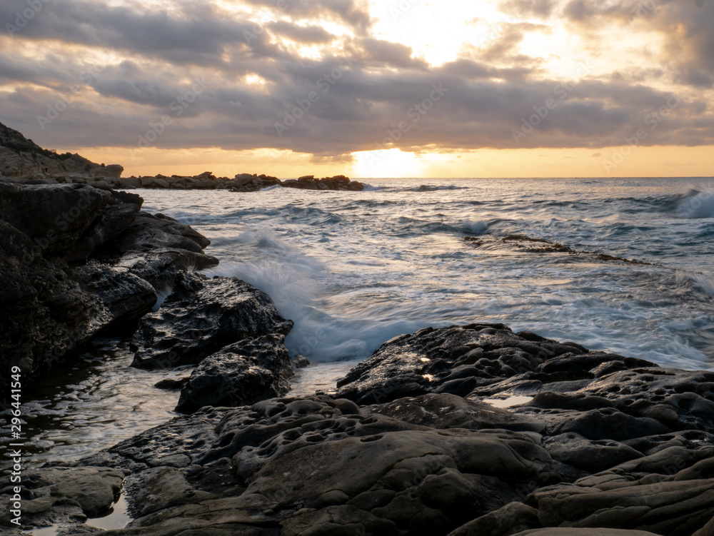  Rocky beach by the sea at dawn in Cabo de Huertas Alicante