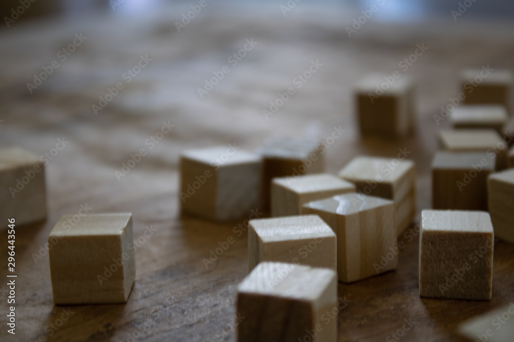 Wooden small blocks on the background. Background for desktop. Office style.Agile and scrum. Team players.Social life.In the office.Equality and diversity