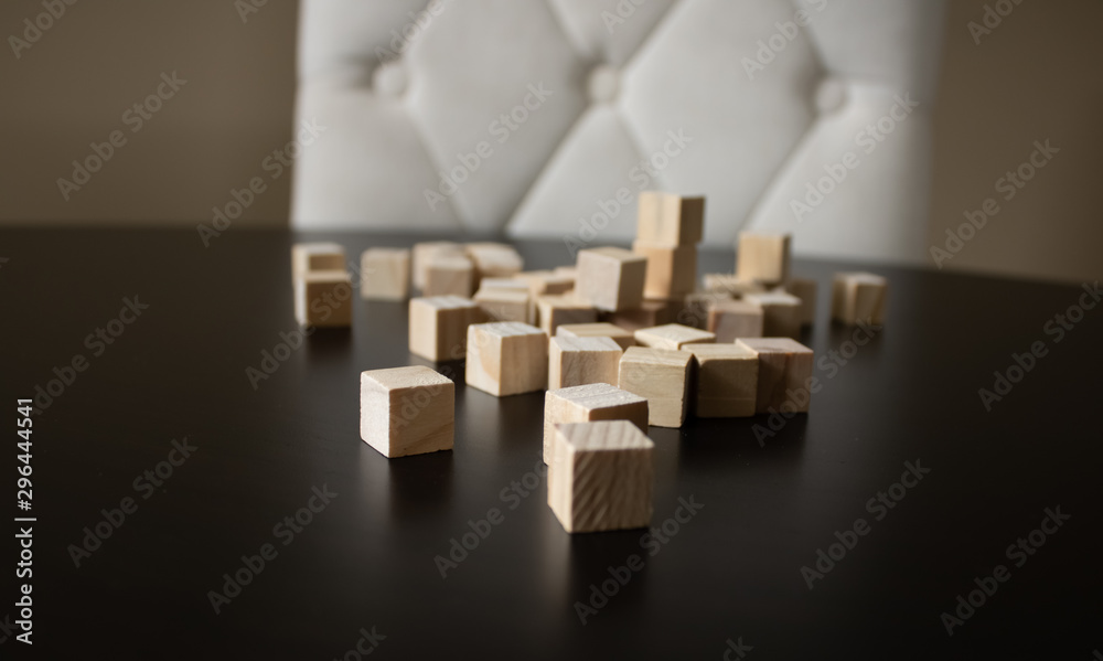 Wooden small blocks on the background. Background for desktop. Office style.Agile and scrum. Team players.Social life.In the office.Equality and diversity