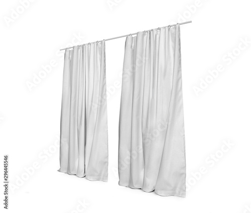 Two white curtains hanging on the rail Isolated on a white background, front view. Photo ready for mock up.