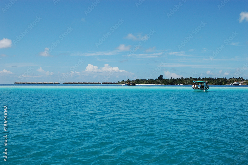 The blue Vilamendhoo Island in the Maldives