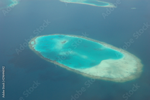 Coral atolls seen from the hydroplane in the Maldives