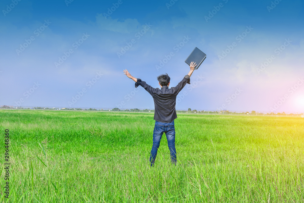Man holding computer notebook for work and shopping online,technology concept Man holding computer notebook for work and shopping online,technology concept