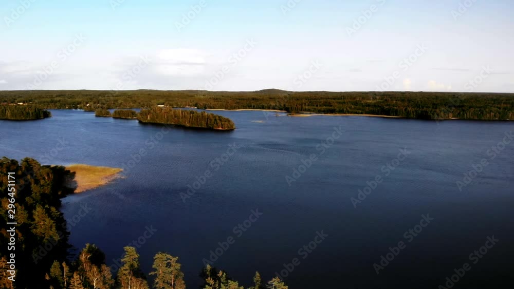 4K Aerial: panning above a calm lake during golden hour in sweden 4K Aerial: panning above a calm lake during golden hour in sweden