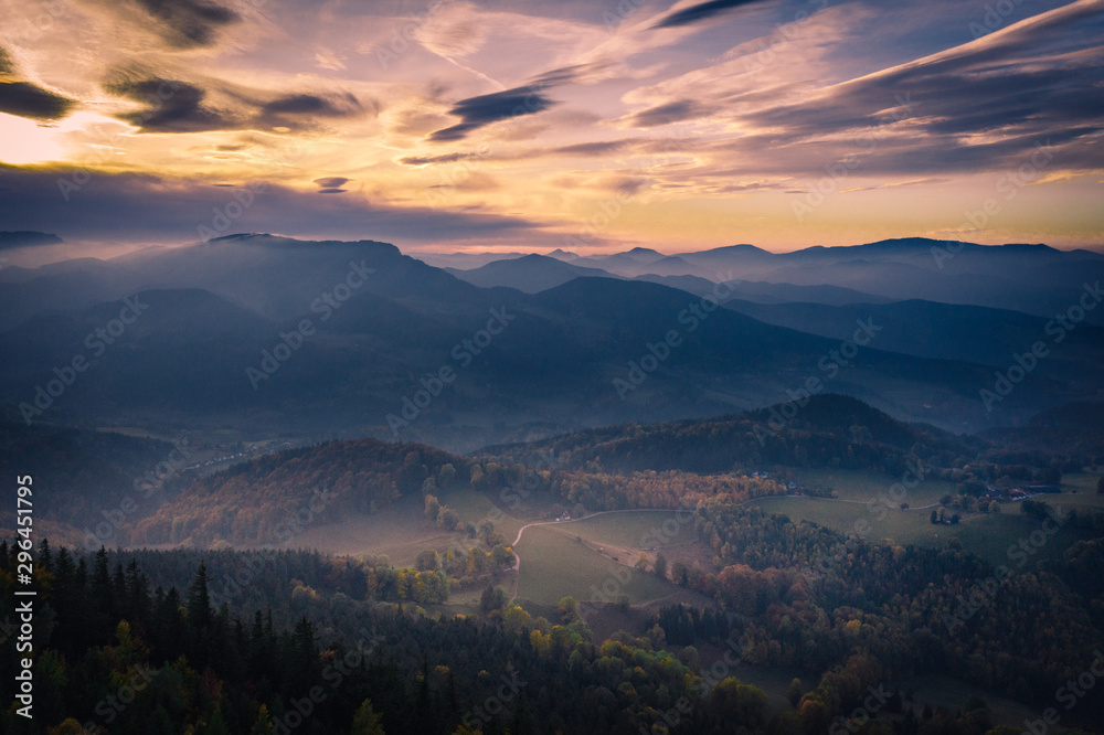 Fog on the mountains during sunset in autumn Fog on the mountains during sunset in autumn