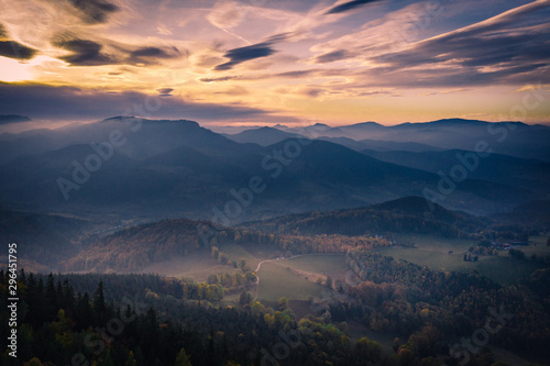 Fog on the mountains during sunset in autumn