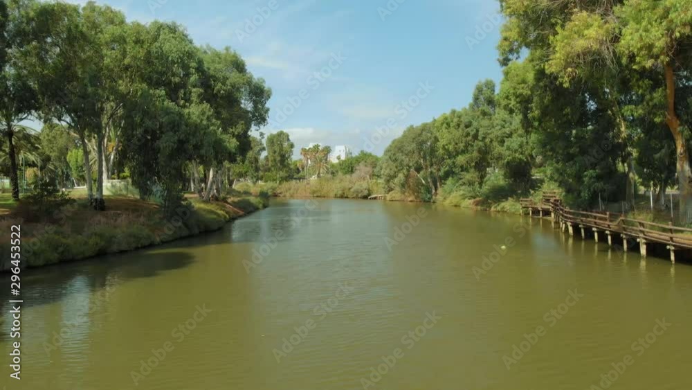 Cruising down a green beautiful river Cruising down a green beautiful river
