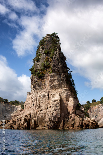 Cliffs and rock formations along the coastline of the Coromandel Peninsula