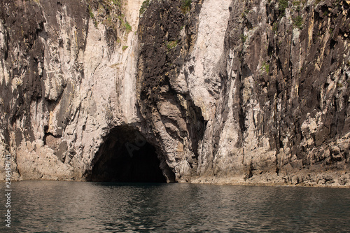Cliffs and rock formations along the coastline of the Coromandel Peninsula