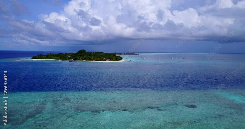 Aerial View Of Tropical Paradise Island With White Sand And Crystal Clear Water. Maldives
Aerial View Of Tropical Paradise Island With White Sand And Crystal Clear Water. Maldives
