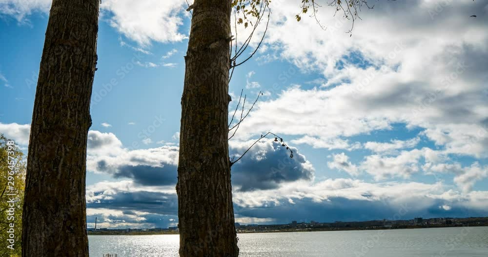 Smooth camera movement between two trees. Autumn sun, timelapse, hyperlapse. Beautiful autumn landscape Smooth camera movement between two trees. Autumn sun, timelapse, hyperlapse. Beautiful autumn landscape
