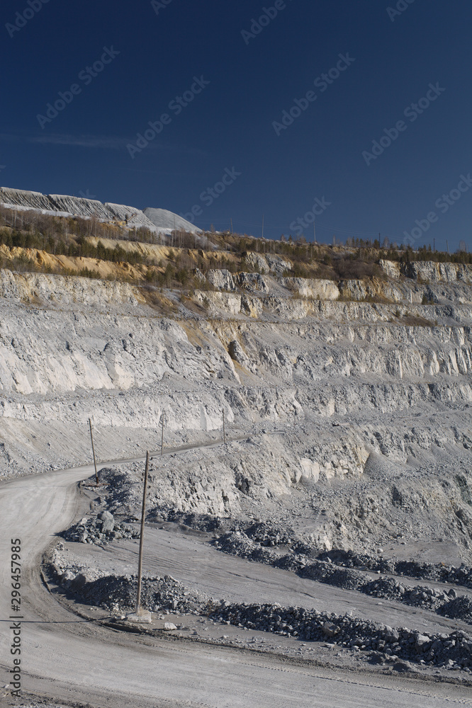 Fragment of the relief in the limestone quarry, industrial background. Mining industry.