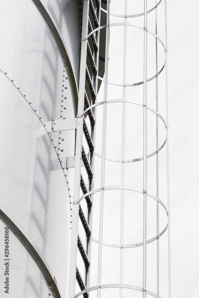 Ladder on silo for storage grain after harvest, detail of agricultural equipments Ladder on silo for storage grain after harvest, detail of agricultural equipments