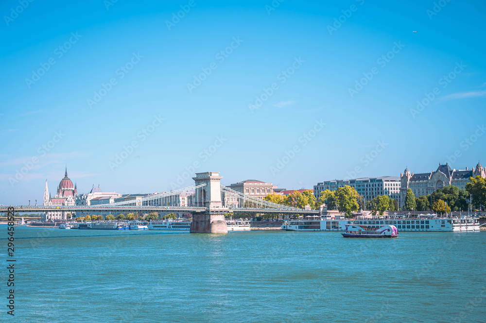 Famous Bridge on Danube river in Budapest city. Hungary. Urban landscape panorama with old building