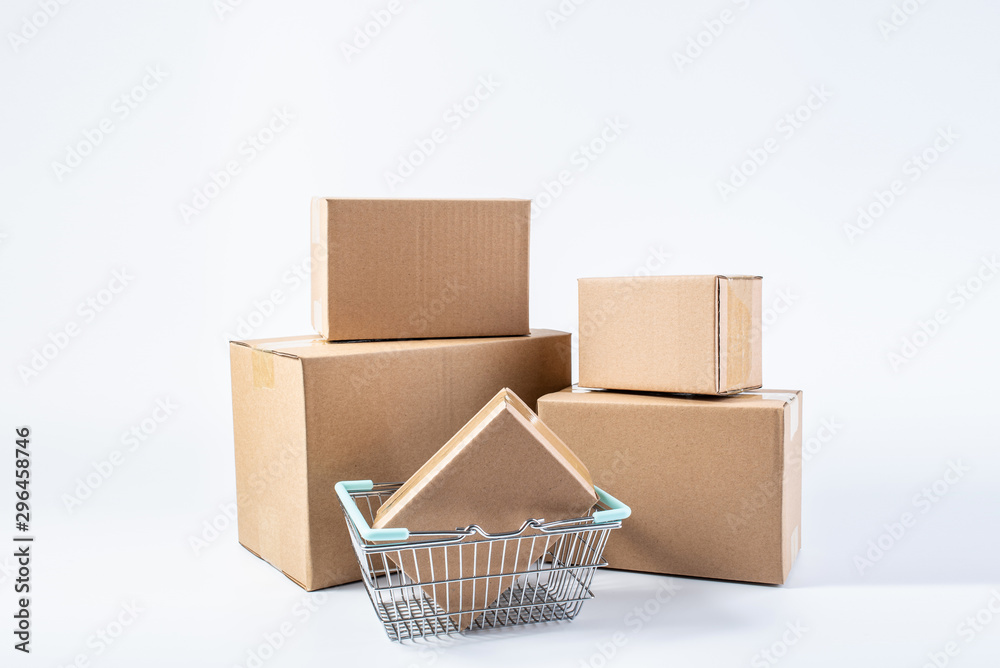 A bunch of express box paper boxes and shopping baskets consumption online shopping concept map A bunch of express box paper boxes and shopping baskets consumption online shopping concept map