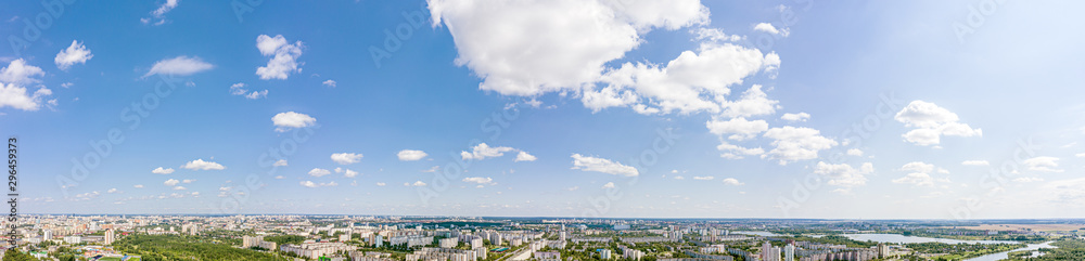 Aerial panoramic view, cityscape of Minsk. City residential area under blue sky in summer